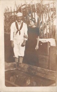 RPPC SOLDIER & HIS GIRL MILITARY REAL PHOTO POSTCARD (c. 1918)