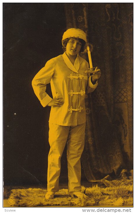 RP; Woman wearing pajamas holding lit candle, 20-30s(2)