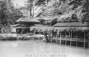 Japan  Pond with building on stilts