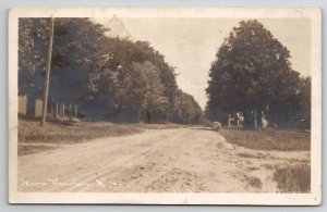 RPPC New London NH Dirt Road And Homes c1910 Real Photo Postcard A47