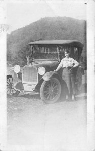 RPPC WOMAN & HER CAR LICENSE PLATE 21229 REAL PHOTO POSTCARD (c. 1920)