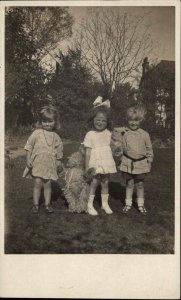 Cute Children with Teddy Bear and Toy Stuffed Dog c1910 Real Photo Postcard