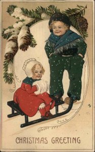 Christmas Boy and Baby Sister Little Girl Sledding Sled c1910 Vintage Postcard