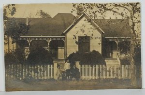 Rppc Lovely Home Cute Little Children at Gate Postcard O3