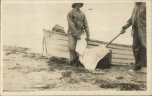 Fishing Industry Fishermen Boat Doing What? c1910 Real Photo Postcard