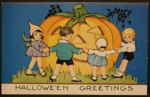 1900s Halloween Postcard Little Children Gathered Around Giant Jack-O'-Lantern