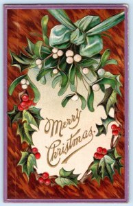 1914 MERRY CHRISTMAS EMBOSSED HOLLY PRINTED IN GERMANY ANTIQUE POSTCARD