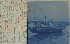 BELFAST MAINE TO FRANCE~YOUNG WOMAN ROWS BOAT~1908 CYANOTYPE REAL PHOTO POSTCARD