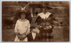 RPPC Young Family Mother in Plaid Coat Son Won't Look at Camera Postcard G24