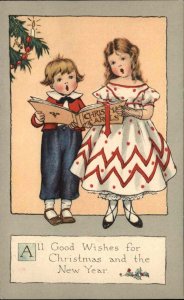 Gibson Christmas Boy and Girl Singing Christmas Carols Caroling Vintage PC