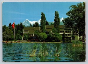 Gwatt Home in Switzerland Flag & Mountains 4x6 Vintage Postcard 0181