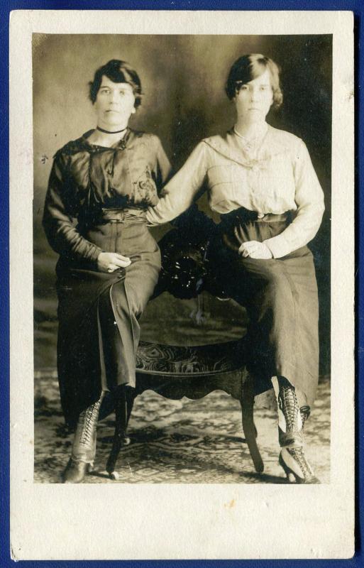 2 Women at photo studio posing with each other real photo postcard RPPC