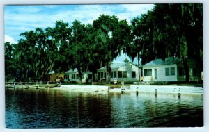 MINNEOLA, Florida FL ~Roadside Motel LAKESIDE COTTAGES Ann & Lewis Butt Postcard