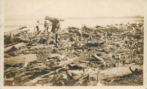 Postcard RPPC 1912 Gisbourne New Zealand Logging Salvage after storm 23-3866