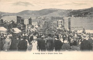 H26/ Cripple Creek Colorado Postcard c1910 Holiday Scene Crowd Parade