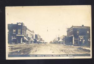 RPPC BAXTER SPRINGS KANSAS DOWNTOWN MILITARY STREET OLD M.L ZERCHER POSTCARD