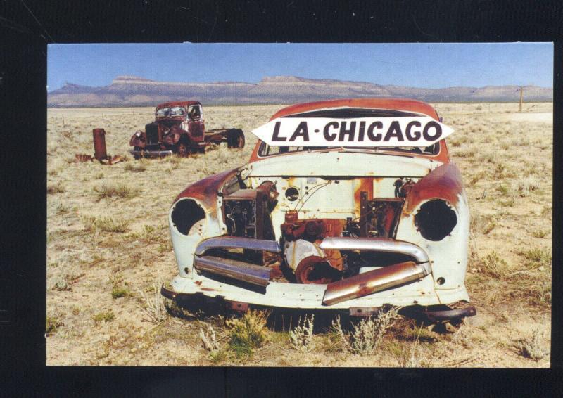 THRUXTON ARIZONA ROUTE 66 WRECKED CARS TRUCK POSTCARD