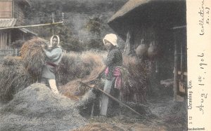 Thrashing Rice Japanese Farm Workers Japan 1910s handcolored postcard