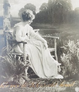 Antique 1900s German Postcard 'Only those who know longing...' woman chair lake