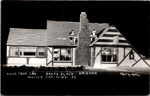 Real Photo PC Christmas Tree Inn, Boulder Dam Hi-Way 93 in Santa Claus, Arizona