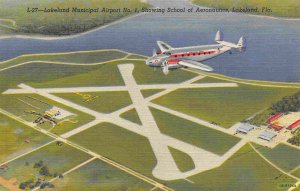 Plane Flying Over Lakeland Municipal Airport Florida 1950s linen postcard