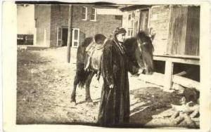 RP: Woman wearing Buffalo Fur coat &  Horse, USA, 00-10s