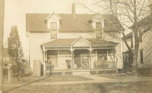 RPPC Postcard Victorian House Gingerbread Details Dormer Windows Dog Unknown US