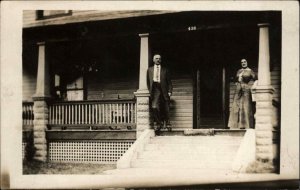 Man on His Porch - Lima Ohio Written on Back c1910 Real Photo Postcard
