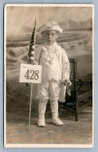 WILDBOOD NJ BOY w/ US FLAG & TOMAHAWK PATRIOTIC ANTIQUE REAL PHOTO POSTCARD RPPC