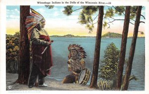 WINNEBAGO INDIANS IN THE DELLS OF THE WISCONSIN RIVER POSTCARD (c. 1920s)