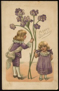 A Happy Birthday. Children with Violets. Vintage embossed postcard