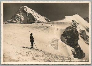 WINTER SPORT SKIING SCENE SWITZERLAND ANTIQUE REAL PHOTO POSTCARD RPPC