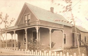 1907 WESTVILLE INDIANA FARMHOUSE YOUNG GIRL ON PORCH RPPC POSTCARD P1323