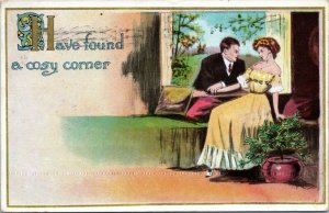 Have found a cosy corner couple man in window romance postcard