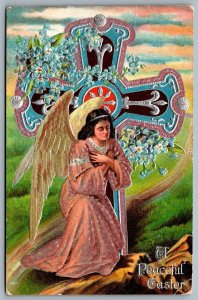 Postcard c1910s A Peaceful Easter Embossed Angel With Wings Cross Floral