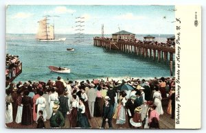 1908 ASBURY PARK NEW JERSEY WATCHING PASSING YACHTS VERY EARLY POSTCARD  P3493