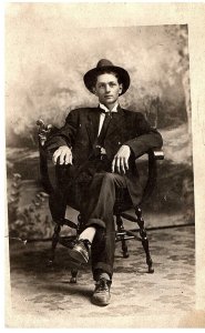 RPPC Postcard Portrait Main in Suit w Hat Wood Chair 1920s