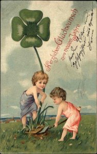 German New Year's Day Child Digs Up Shamrock Fantasy c1910 Vintage Postcard