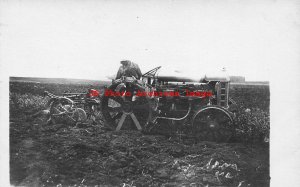 Unknown Location, RPPC, Farmer with Early Tractor with Steel Wheels Plowing