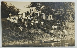 Rppc Large Group of Men Along the River Unique Building Men On Roof Postcard O16