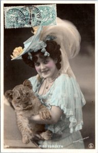 RPPC Miss Forgeth in white and blue with lion cub SIP 1520 Moreau & Kivatizky