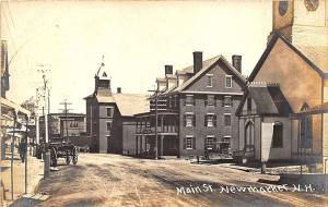 Newmarket NH Main Street Store Fronts Horse & Wagon Church Real Photo Postcard