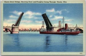 VINTAGE POSTCARD CHERRY STREET DRAW BRIDGE AND FREIGHTER AT TOLEDO OHIO 1940s