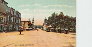 EVERETT MASSACHUSETTS~EVERETT SQUARE-STOREFRONTS~ROTOGRAPH TINTED  POSTCARD