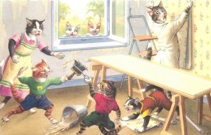 1960s Mainzer dressed Cats decorating Catfight #4909 Postcard 25-2409