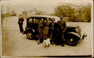 IMV00973 dog group photo romania real photo old car social history