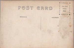 RPPC Postcard Man Wearing Long Coat and Hat Hand in Pocket