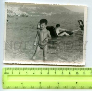 484434 USSR little boy posing in the sea the beach inflatable mattress photo