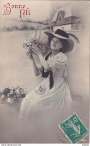 RP; BIRTHDAY, 1900-10s; Bonne Fete, Woman wearing hat holding basket of flowe...