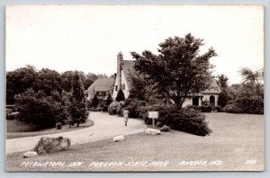 RPPC~Angola Indiana~Pokagon State Park~Potawatomi Inn~Lady On Road~Sign~1950s PC